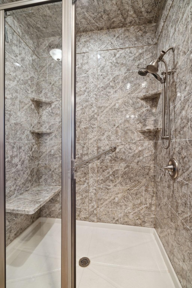 bathroom featuring a stall shower