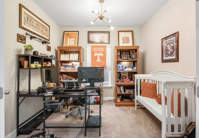 carpeted bedroom with baseboards and a notable chandelier