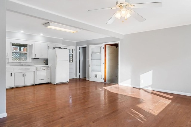 478 S Grundy Quarles Hwy, Gainesboro, TN 38562 - interior space featuring dark wood finished floors, light countertops, white cabinets, white appliances, and a sink