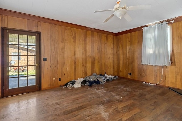 478 S Grundy Quarles Hwy, Gainesboro, TN 38562 - unfurnished room featuring wood-type flooring, wooden walls, and ceiling fan