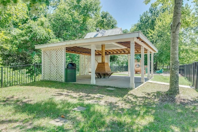 exterior space featuring a detached carport and a fenced backyard