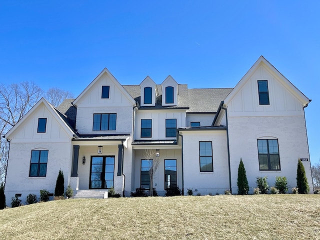 view of front of home with a standing seam roof, board and batten siding, metal roof, a shingled roof, and crawl space