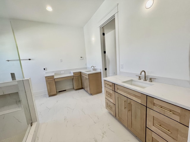 bathroom featuring recessed lighting, marble finish floor, two vanities, and a sink