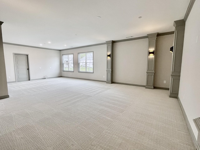 unfurnished room featuring light colored carpet, baseboards, and ornamental molding