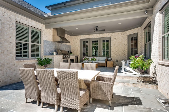 view of patio / terrace with area for grilling, french doors, and outdoor dining area