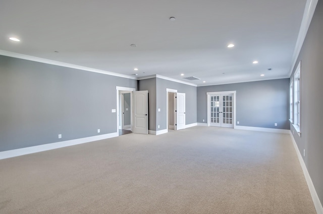 spare room featuring recessed lighting, french doors, and baseboards