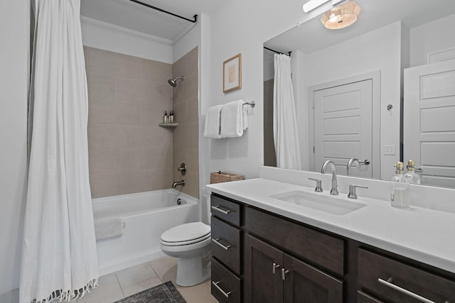 full bathroom featuring tile patterned floors, toilet, vanity, and shower / bathtub combination with curtain