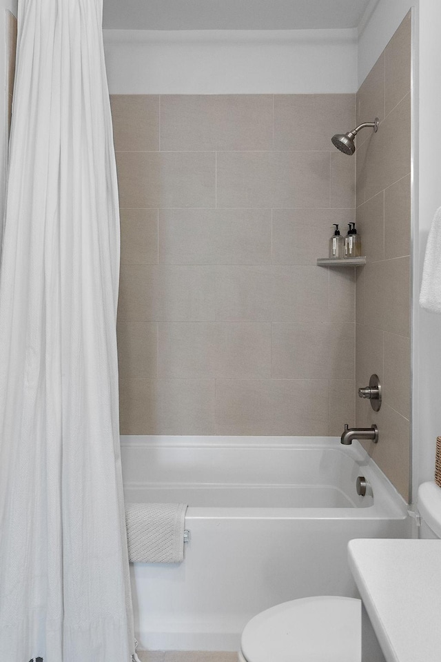 full bathroom featuring vanity, toilet, and shower / tub combo with curtain