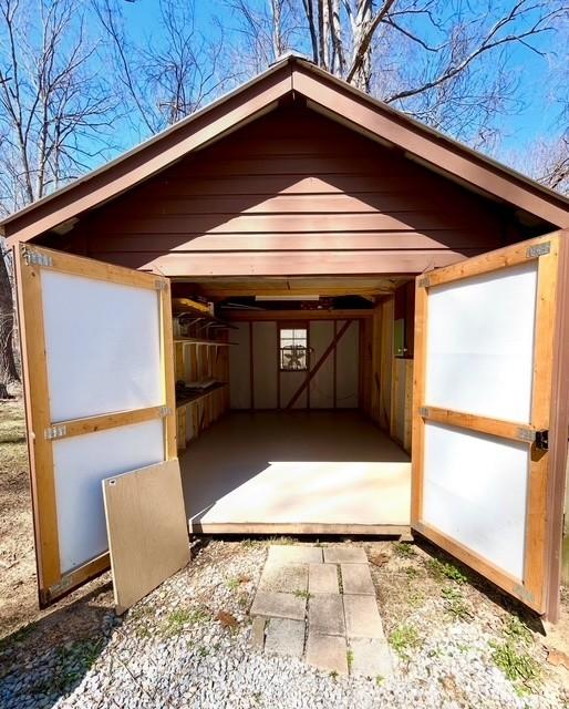 view of outbuilding with an outdoor structure