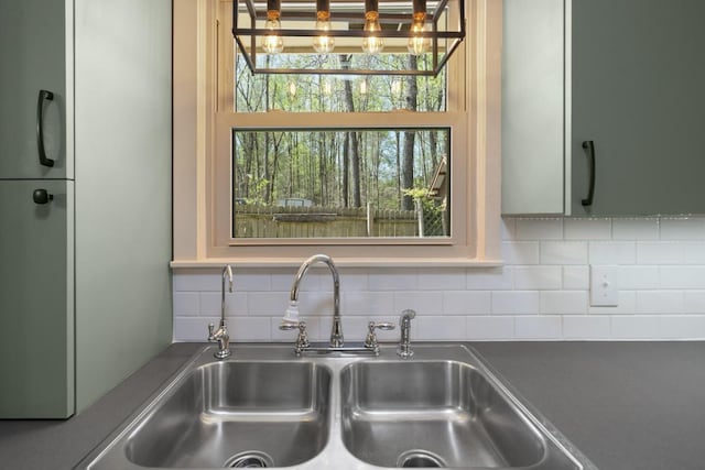 7704 Chester Rd, Fairview, TN 37062 - kitchen view of decorative backsplash and dark countertops