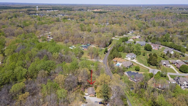 7704 Chester Rd, Fairview, TN 37062 - aerial view of property and surrounding area with a heavily wooded area and nearby suburban area
