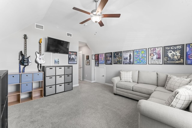 living room with vaulted ceiling, visible vents, carpet floors, and ceiling fan