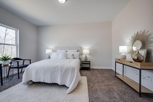 carpeted bedroom with baseboards