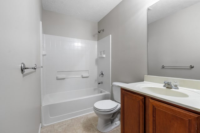 bathroom featuring toilet, vanity, bathing tub / shower combination, tile patterned floors, and a textured ceiling