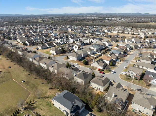 aerial view featuring a residential view and a mountain view