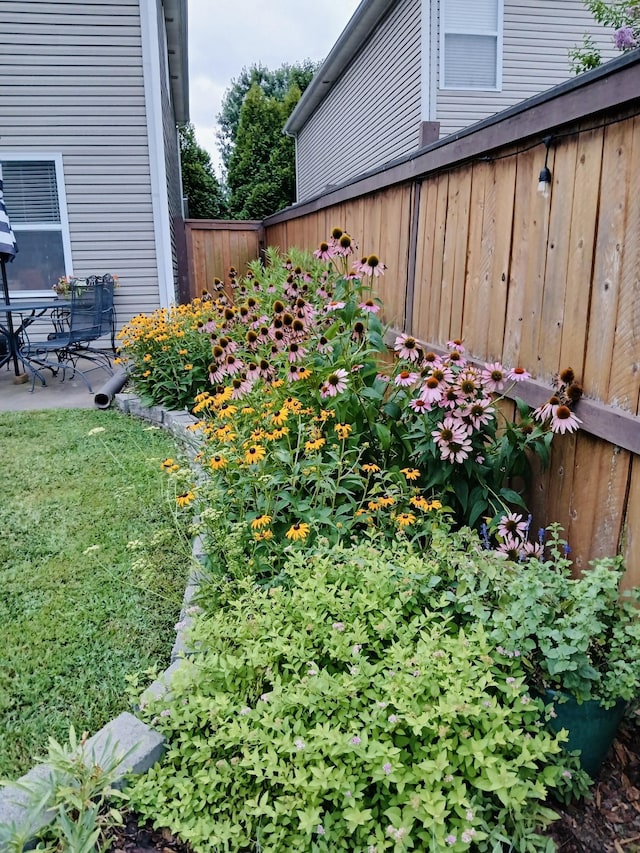 view of yard with a patio and fence