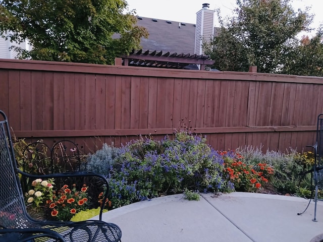 exterior space with a fenced backyard