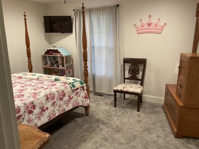 200 Marlin Rd, White House, TN 37188 - bedroom featuring baseboards and light carpet