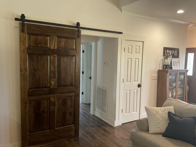 200 Marlin Rd, White House, TN 37188 - living area with visible vents, recessed lighting, a barn door, and dark wood-style flooring