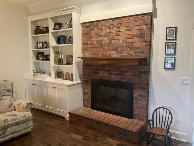 200 Marlin Rd, White House, TN 37188 - living area with dark wood finished floors and a brick fireplace