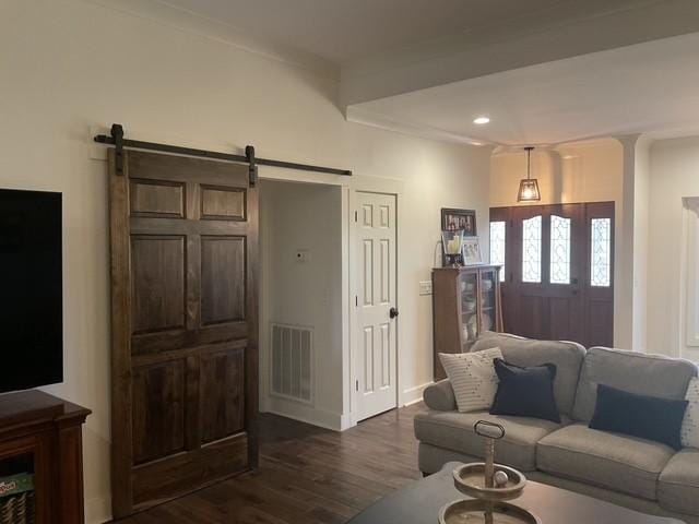 200 Marlin Rd, White House, TN 37188 - living room featuring dark wood-style floors, visible vents, and a barn door