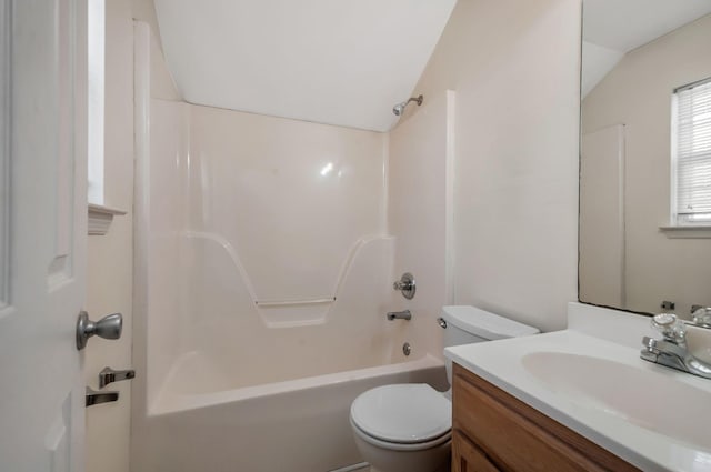 full bath with shower / bath combination, toilet, vanity, and lofted ceiling