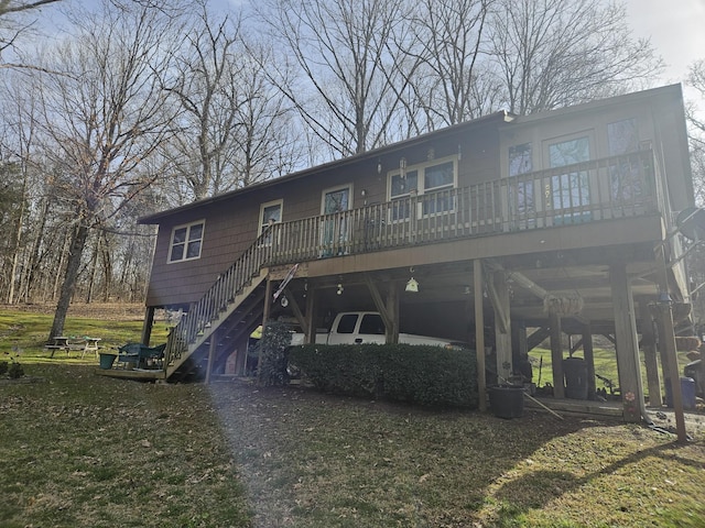 back of property featuring stairway