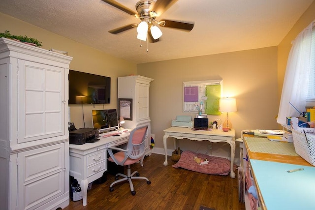 office area featuring baseboards, a textured ceiling, ceiling fan, and dark wood-style flooring