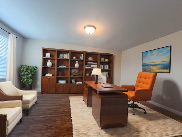 office with baseboards and dark wood-type flooring