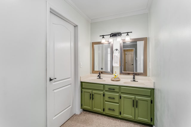 full bathroom featuring double vanity, ornamental molding, and a sink