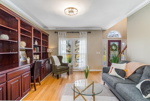 living room with baseboards, light wood-style flooring, and ornamental molding