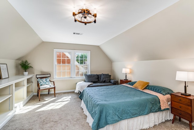 bedroom featuring visible vents, lofted ceiling, carpet, and baseboards