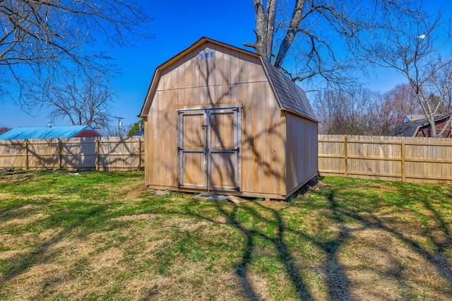 view of shed with a fenced backyard