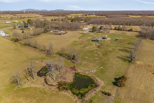 birds eye view of property featuring a rural view