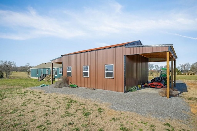 view of outbuilding with an outbuilding and driveway