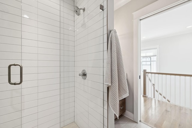 bathroom with tile patterned floors and a stall shower