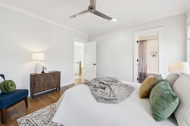 bedroom with wood finished floors, baseboards, recessed lighting, ceiling fan, and crown molding