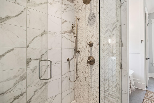 bathroom featuring a shower stall