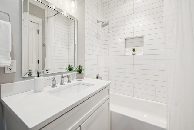 full bathroom with bathtub / shower combination and vanity