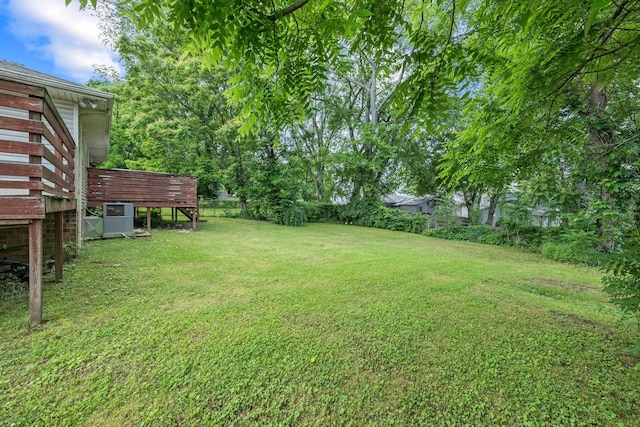 view of yard with a wooden deck