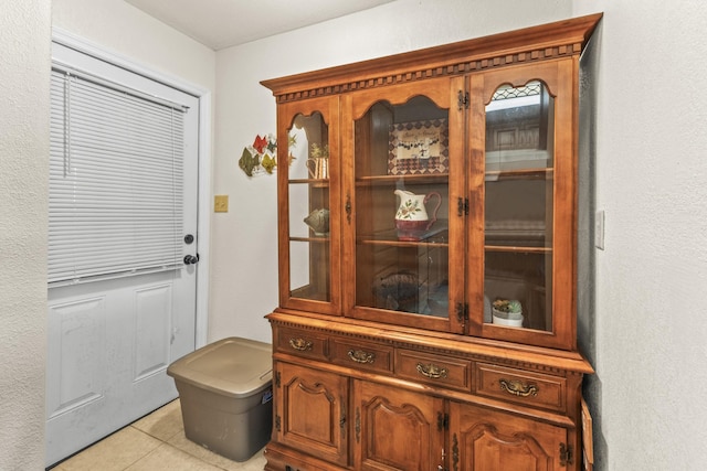 entryway featuring light tile patterned flooring