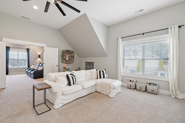 living area with a ceiling fan, carpet, visible vents, and baseboards