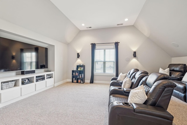 living area featuring visible vents, baseboards, carpet, and vaulted ceiling