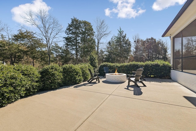 view of patio / terrace featuring a fire pit