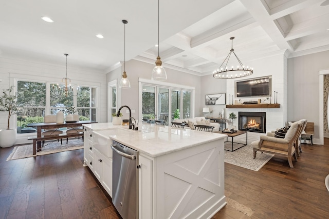 kitchen with dark wood-style floors, a fireplace, dishwasher, beamed ceiling, and a notable chandelier