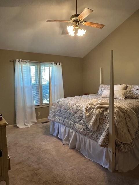 bedroom with carpet flooring, a ceiling fan, and lofted ceiling