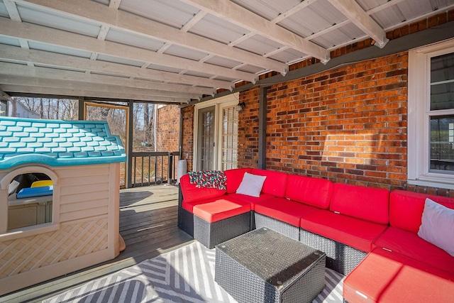 wooden deck featuring an outdoor living space