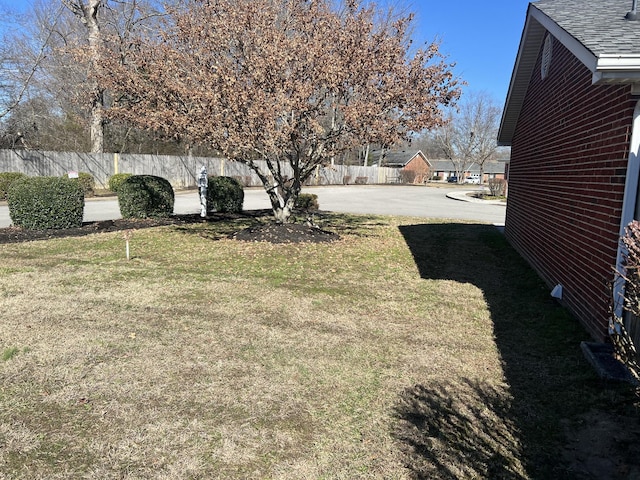 view of yard featuring fence