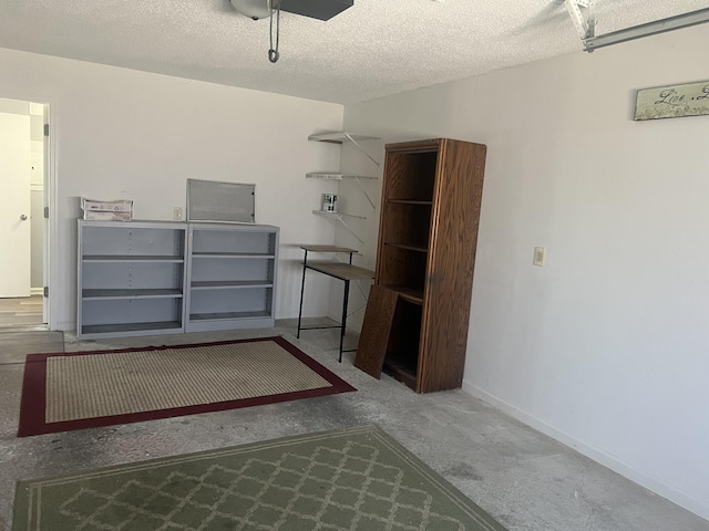 garage with baseboards