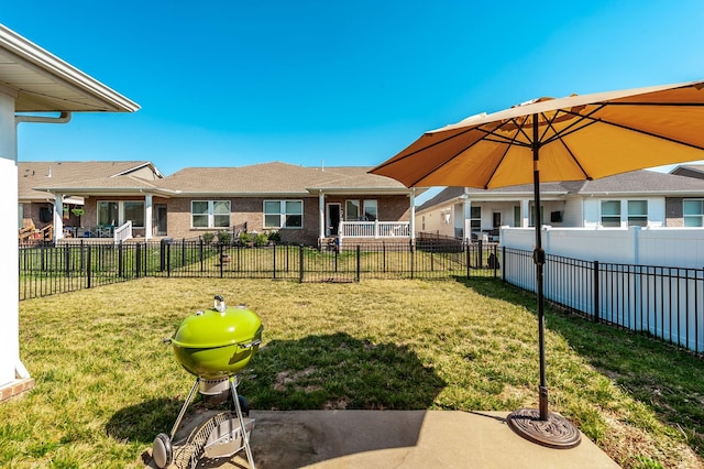 view of yard with a fenced backyard